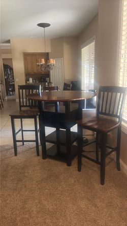 pub table with storage and 2 chairs