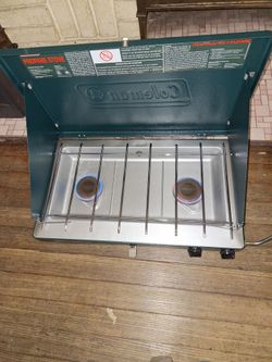 New Coleman classic propane stove. Opened box and lit once.
