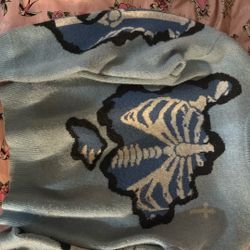A Blue Skeleton Sweater 