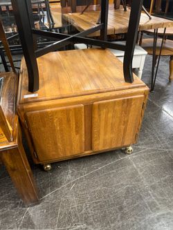 Large MCM end table on wheels