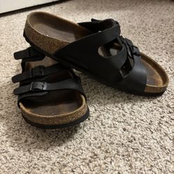 Black size 8 women’s Birkenstocks.
