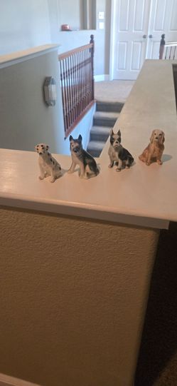 4 vintage Ceramic Dogs