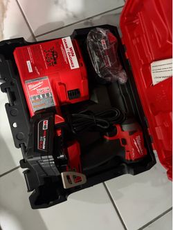 Milwaukee 18v impact battery s and charger new