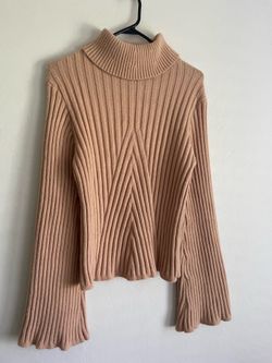 Tan turtleneck sweater