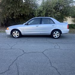 2000 Mazda Protégé, Low Miles Clean Title Great On Gas Very Reliable Grandma’s Car