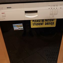 Bosch Dishwasher white and black film on. 24”.