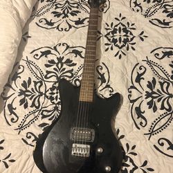 Black electric guitar