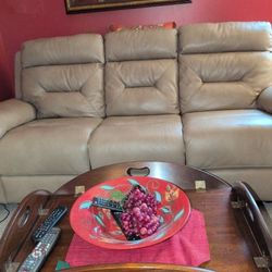 Sofa And Two Recliners In It