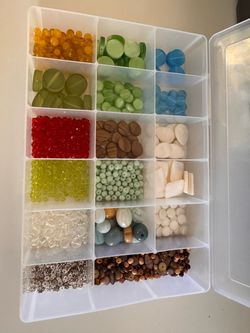 Box full of beads  Used   10 1/2” X 7” Container