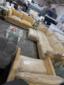 Beautiful, super comfortable living room set made of very soft, washable fabric. 4 pieces, brand new.