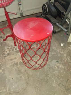 Vintage metal small round table and vintage cast iron tractor seat. Both for 60