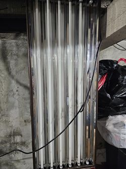 Vegetation hood for growing plants that need high lumens