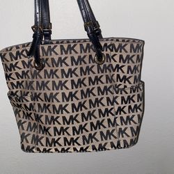 Michael Kors black and brown bag. 