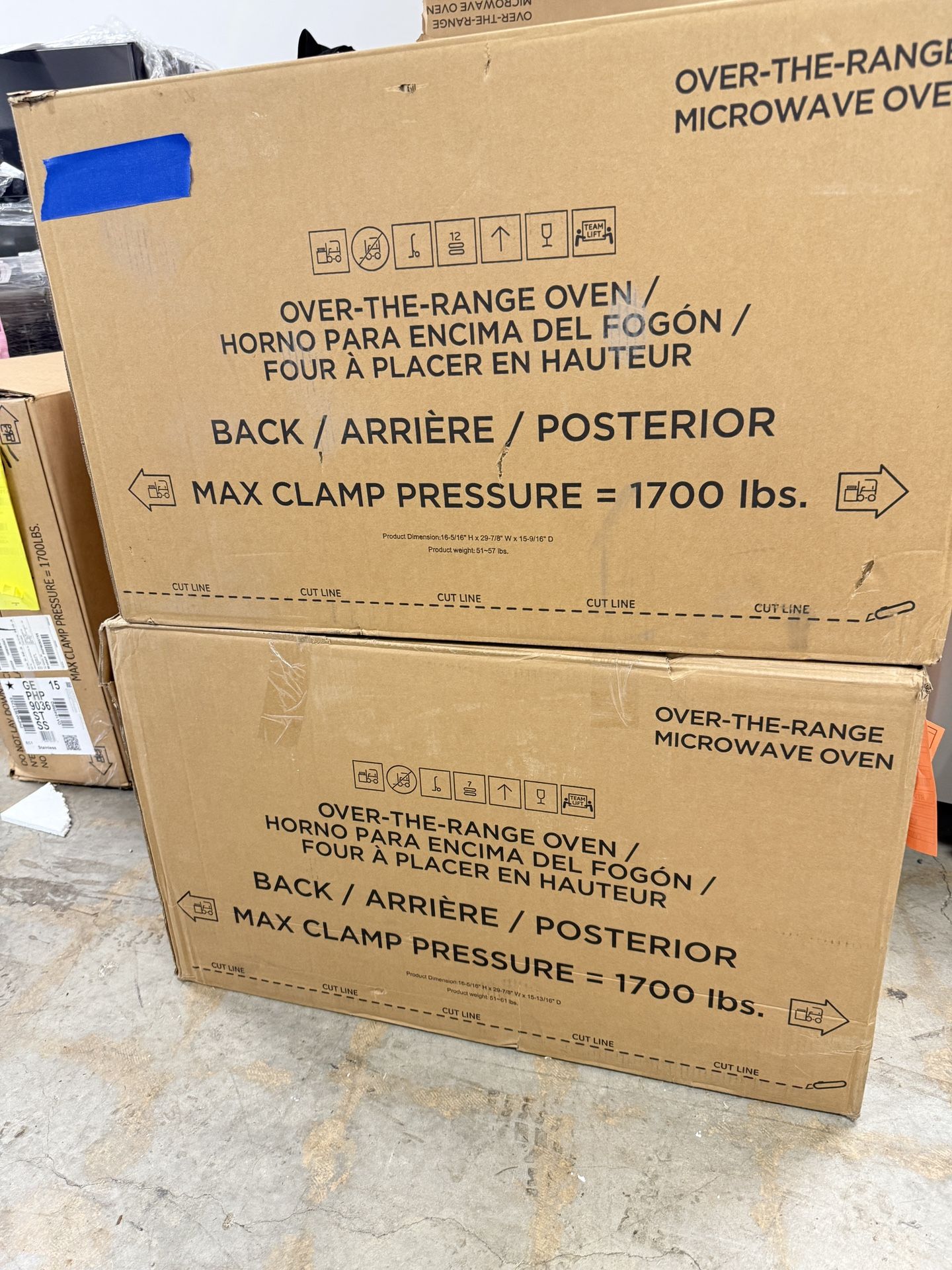 New In Box GE Over Range Microwave