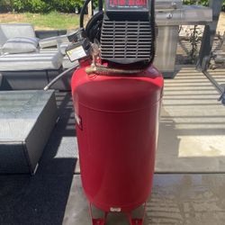 Craftsman 1.5 HP 26 gal air compressor with hose included