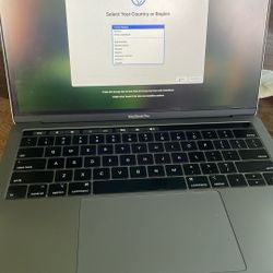 2019 Apple Macbook Pro- Touchbar 120gb Storage