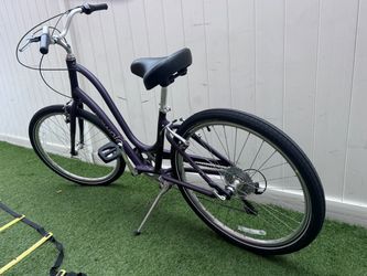 Purple Electra Townie Bike.