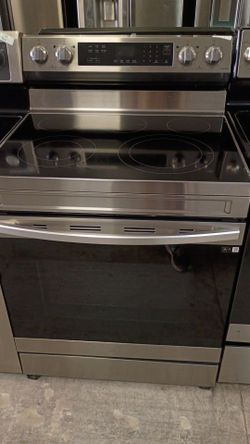 Electric stainless glass top five burners everything works with warranty