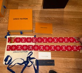 Red monogram belt