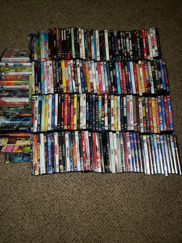 198 DVDS. 20 Unopened 2 stands that hold 45 each.