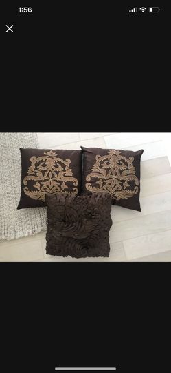 3 brown decorative throw pillows - comes from a very clean, smoke and pet free home. Only used for decorative purposes.