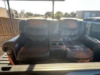 Leather power reclining love seat