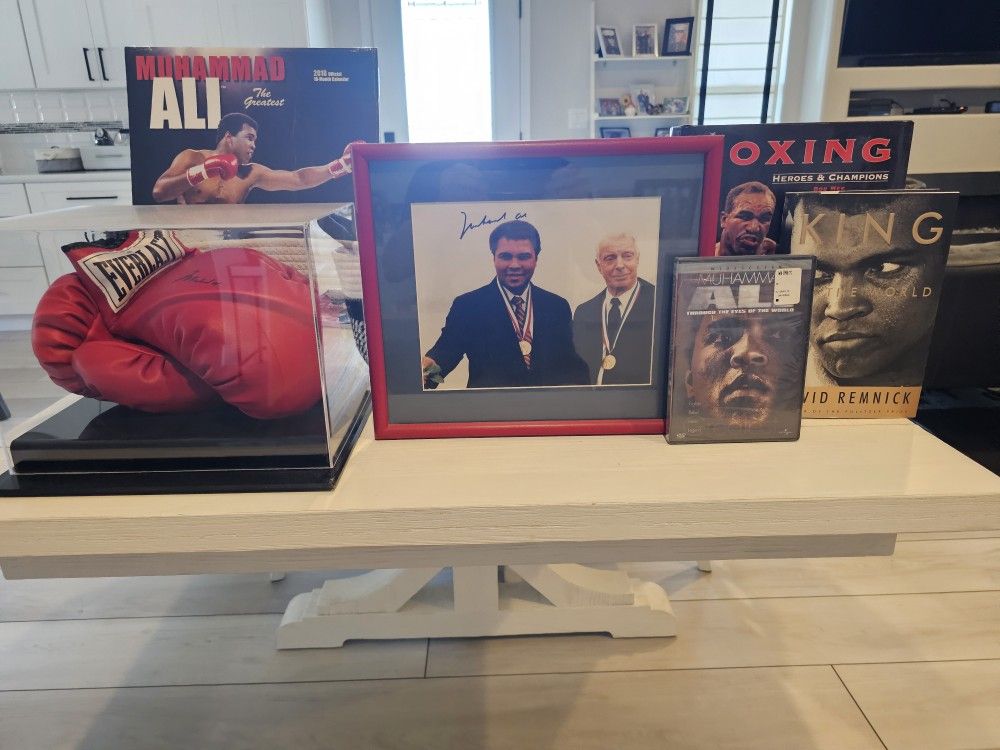 Muhammad Ali autographed boxing gloves