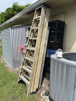 Multiple Ladders 8 Foot Fiberglass And 6 Foot Aluminum Ladders $20 Each