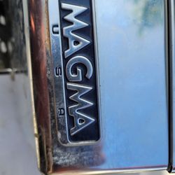 Magma gas grill, designed for marine, camping, and outdoor use.