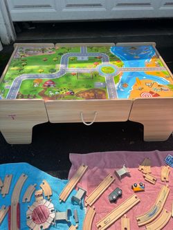 Wooden train table with accessories