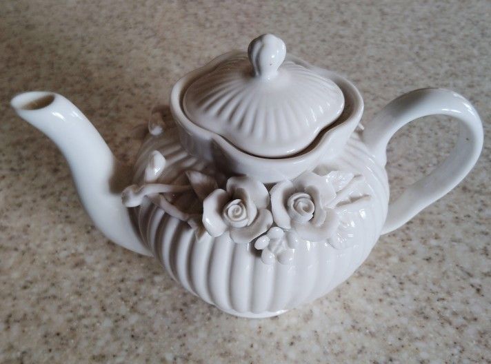 Beautiful Grace Tea Ware White Glazed Porcelain Floral Teapot Collection. 24 oz.