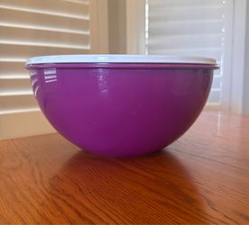 $20 - Tupperware Thatsa Bowl with seal.  32-cup, is ideal for mixing, storing, and serving food. Color - Plum.  Pickup only in the area of 36th Ave an