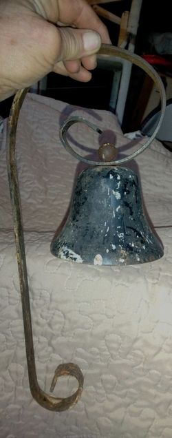 This is a vintage Achla Designs wrought iron hanging knocker bell, which can be used as a patio accent or doorbell. This sells online from 65.00 & Up