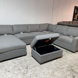 Fabric Sectional Couch With Storage Ottoman. Delivery Available