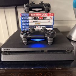 PS4, 4 controllers, camera, and games