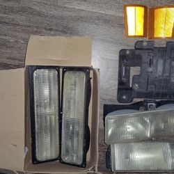 Headlight/running light/marker light housings for 88-98 GMC Sierra