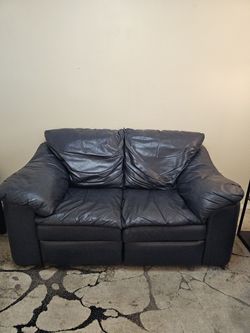 Leather Reclining Loveseat