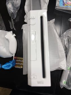 Brand new unused Nintendo Wii RVL-001 Complete Bundle – Wii Fit Board, 2 Remotes & Games