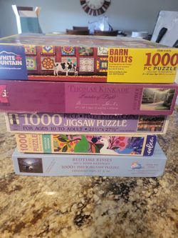 1000 piece puzzles.  5 for $5