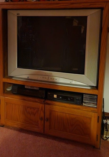 Panasonic tv and oak cabinet 