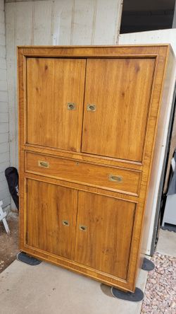 NICE CURIO CABINET WITH OUTLETS