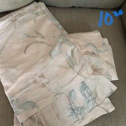 2 pairs of the flowers curtains, 1 pair of the red/burgundy and 2 pairs of the brown.