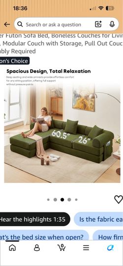 Green sofa/ futon (converts to a bed)