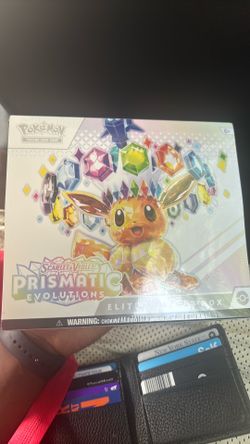 Prismatic Evolution Elite Trainer Box