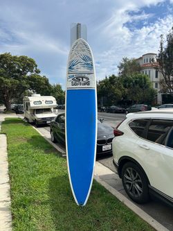 9’ Surftech soft-top surfboard with leash