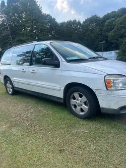White Ford Freestar Minivan