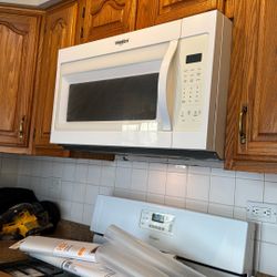 Microwave refrigerator and stove all good condition