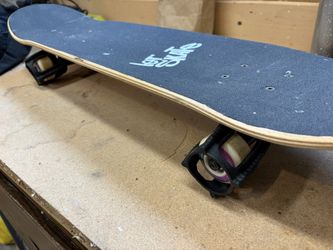 Skateboard, Pads, And Wheel Trainers