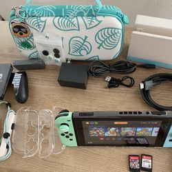 Nintendo Switch and Games Bundle - Animal Crossing Edition - with Super Smash Bros and Mario Kart 8