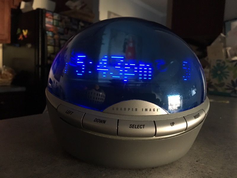 Sharper Image Info Globe , caller id , scrolling Message center